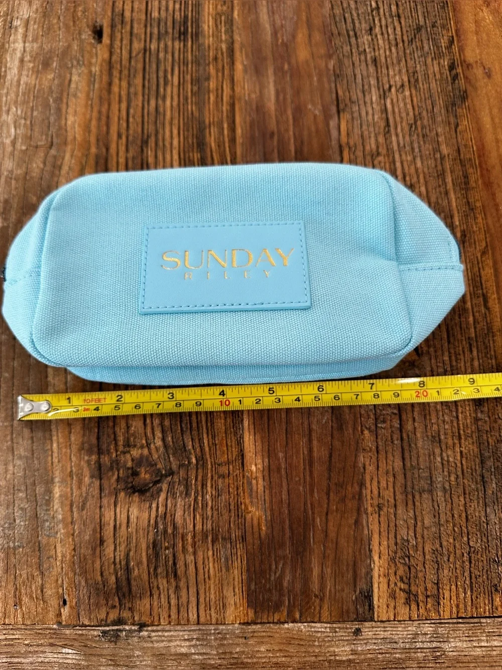 Sunday Riley Pastel Blue Canvas Cosmetic Pouch with Gold Logo